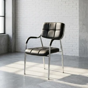 Black leatherette padded visitor chair with grid tufted backrest and seat, chrome steel frame, integrated padded armrests, and 4-leg base.