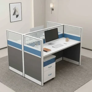 2-seater face-to-face modular office cubicle workstation with white desktops, translucent frosted glass partition dividers, grey and blue fabric panels, and a three-drawer mobile pedestal.