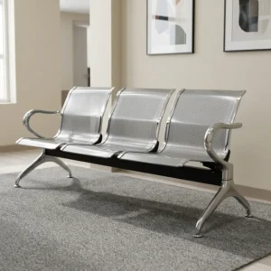 3-seater silver perforated steel airport waiting bench with curved polished chrome armrests and flared legs on a black beam frame.