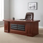 2.0m mahogany executive office desk featuring a dark padded leatherette front modesty panel, decorative wood carving details, and an attached side return credenza.