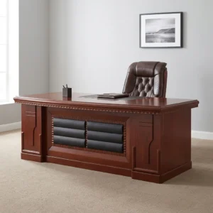 2.0m mahogany executive office desk featuring a dark padded leatherette front modesty panel, decorative wood carving details, and an attached side return credenza.