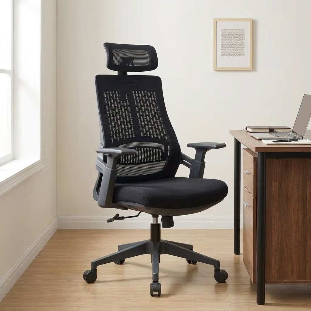 Black high-back mesh office chair with rectangular padded headrest, slatted lumbar support insert, 2D height-adjustable T-armrests, pneumatic lever, and black 5-star swivel caster base.