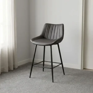 Dark gray leather barstool with vertical channel-tufted backrest, padded bucket seat, and black metal legs with integrated footrest.
