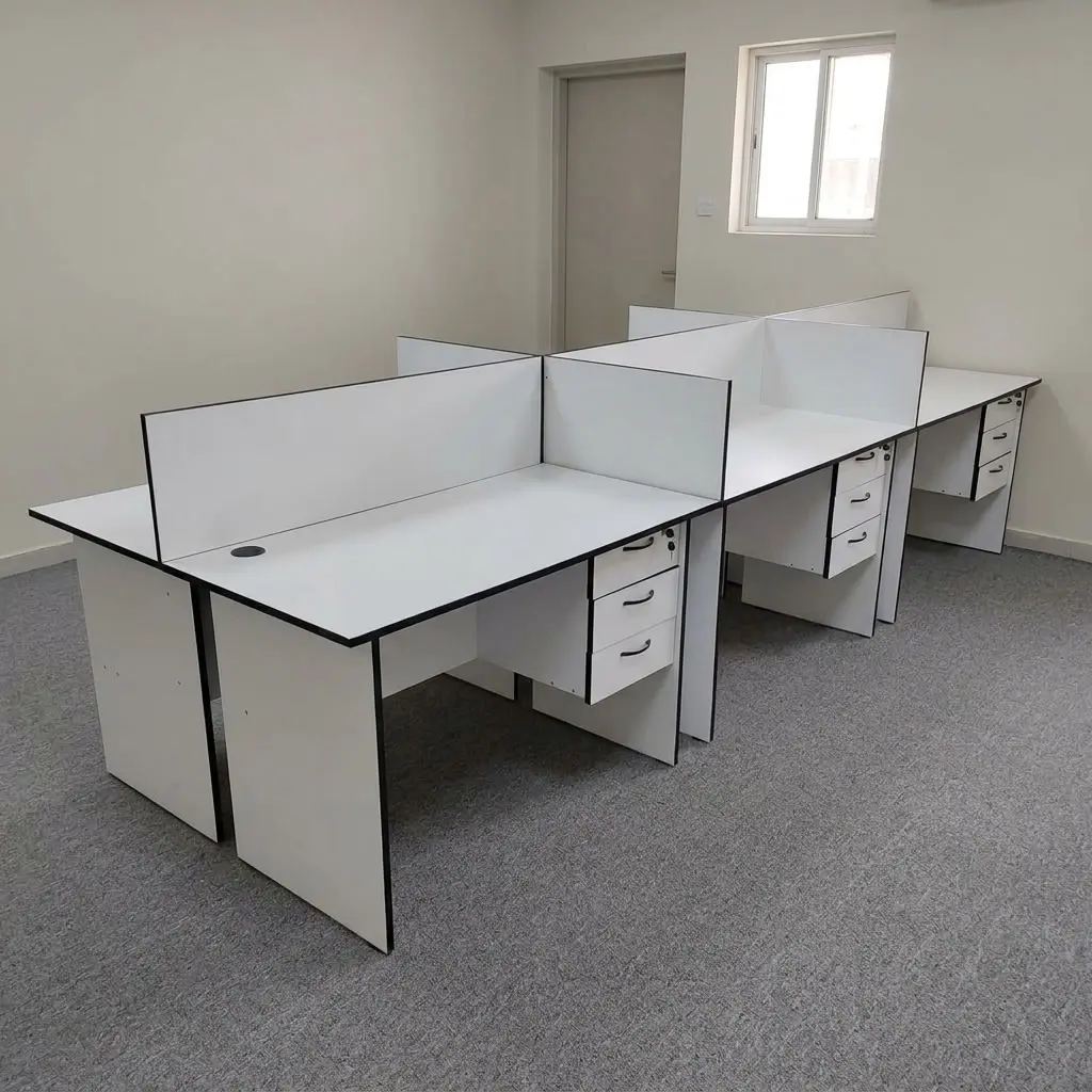 6-seater white wooden workstation cluster with black edge trim, white privacy partition screens, integrated 3-drawer lockable pedestals, and circular cable grommets.