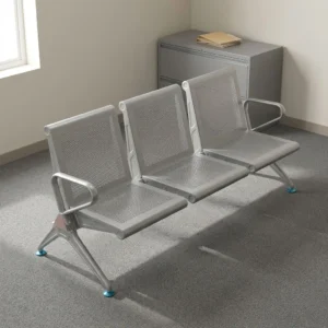 Silver gray 3-seat perforated steel airport waiting bench with side armrests, horizontal beam support frame, and blue leveling feet.