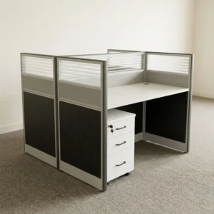 2-person modular office workstation cubicle with frosted glass and fabric divider panels, white desktops, integrated mobile pedestal drawers, and aluminum trim framing.