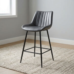 Gray leather counter barstool with vertical channel-stitched backrest, bucket seat, black metal tapered legs, and integrated footrest crossbars.